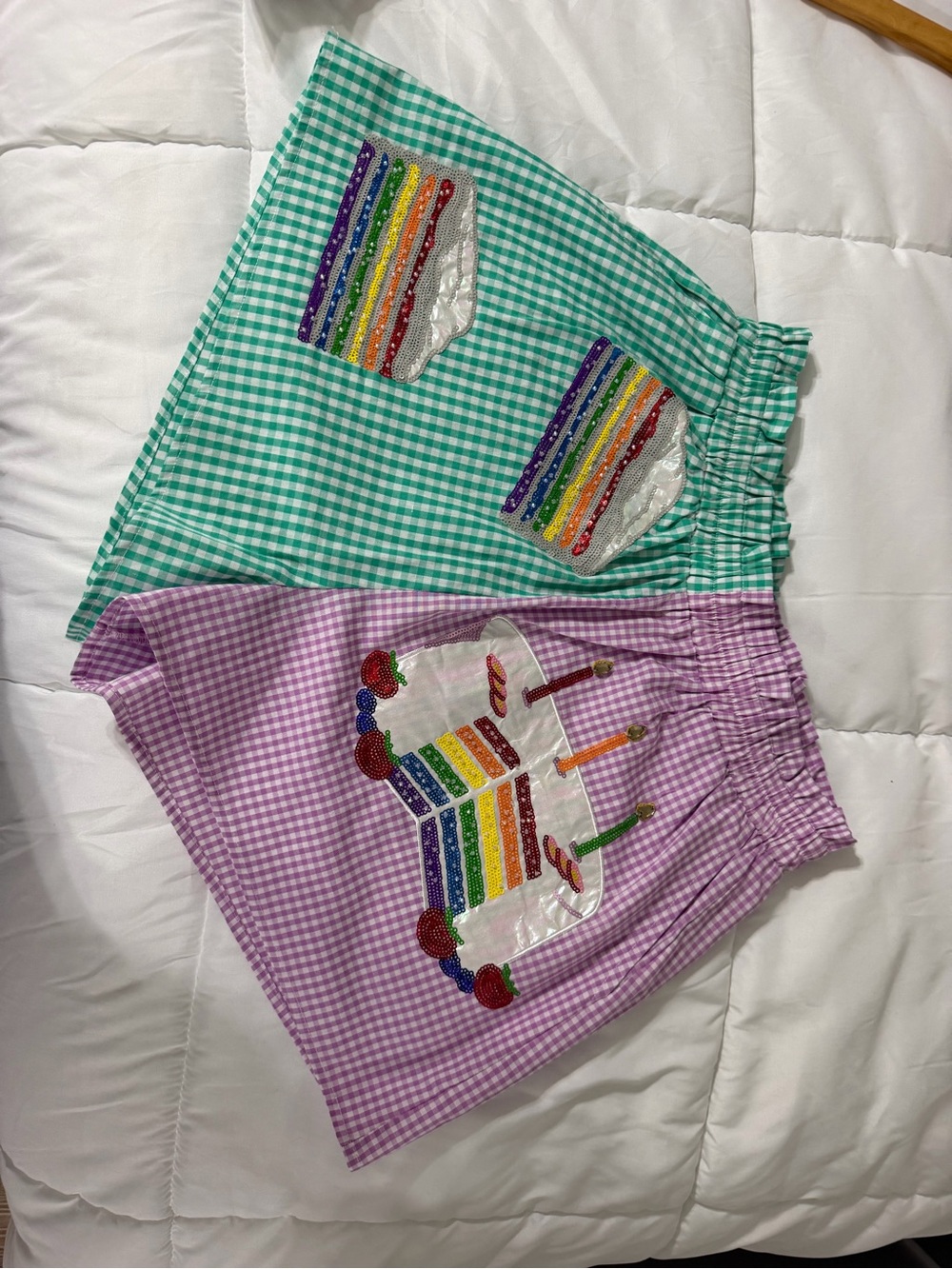 Queen of Sparkles Women’s Gingham Party Shorts with Rainbow Cake Appliqué
